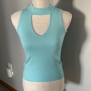 Sleeveless cut out top by  Star City in EUC